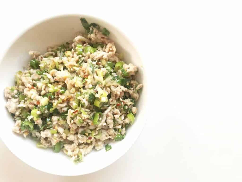 Larb Gai - Bring Thailand home to your own kitchen in just 10 minutes with this quick and delicious Larb Gai, filled with sumptuous Thai flavors such as lime, cilantro, chili and fish sauce. Sweet, savory, spicy and easily served as the best version of TV-dinner there is.