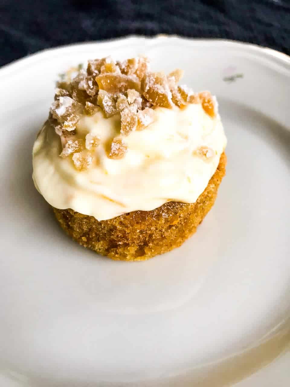 Orange Ginger Carrot Cupcake on a white plate