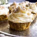 Orange ginger carrot cupcakes on a silver tray