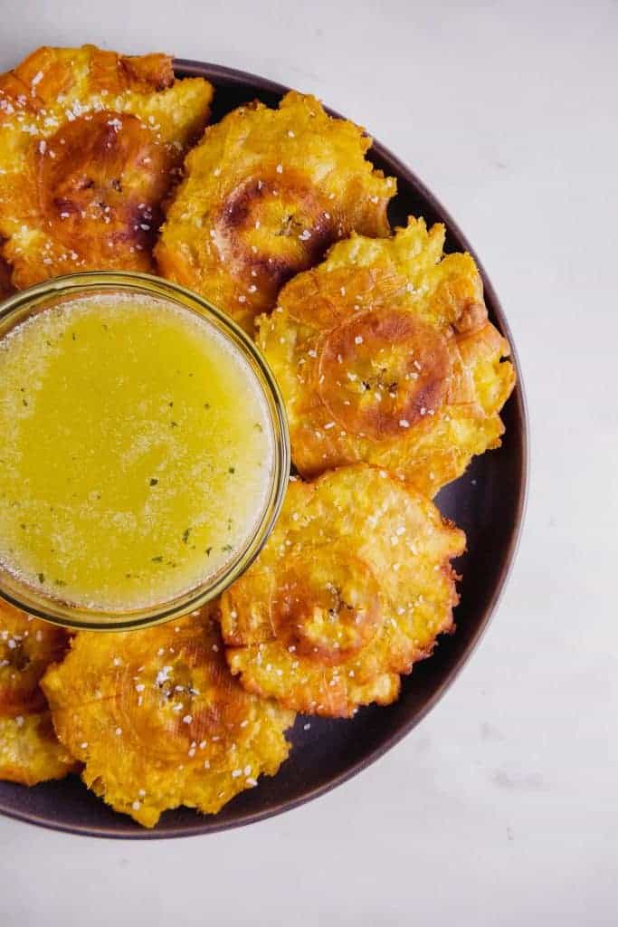 crispy fried plantains with a butter garlic sauce