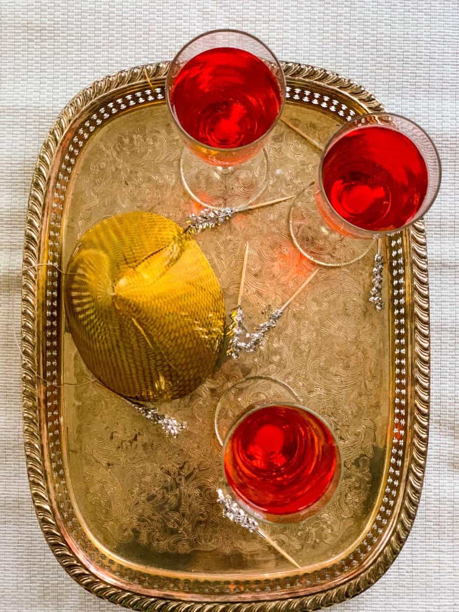 3 glasses of rum & campari champagne cocktail