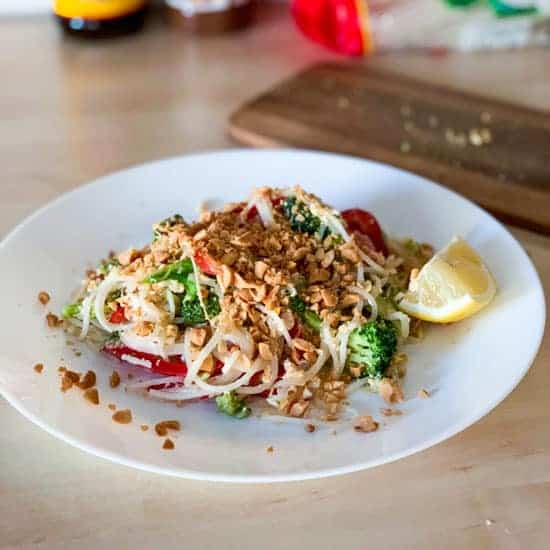 vegetarian pad thai on a white plate