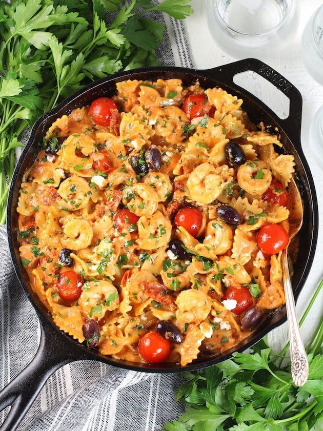 shrimp pasta with tomatoes, olives and feta cheese