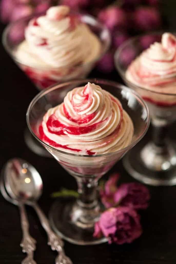 white chocolate cheesecake mousse in a martini glass