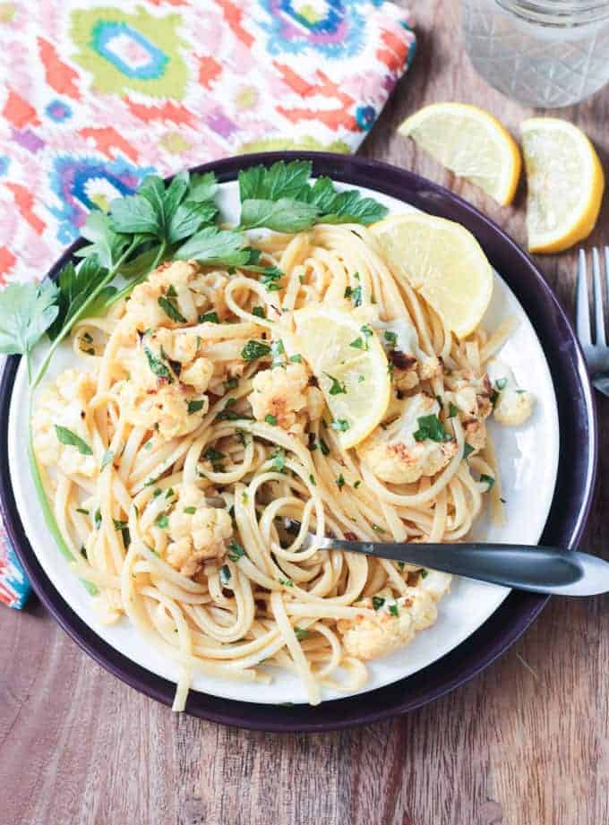 cauliflower pasta on a white plate