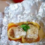 foil packet cod with tomatoes, lemon and potatoes