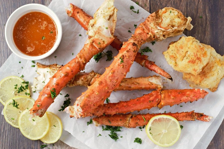 baked king crab legs with sauce