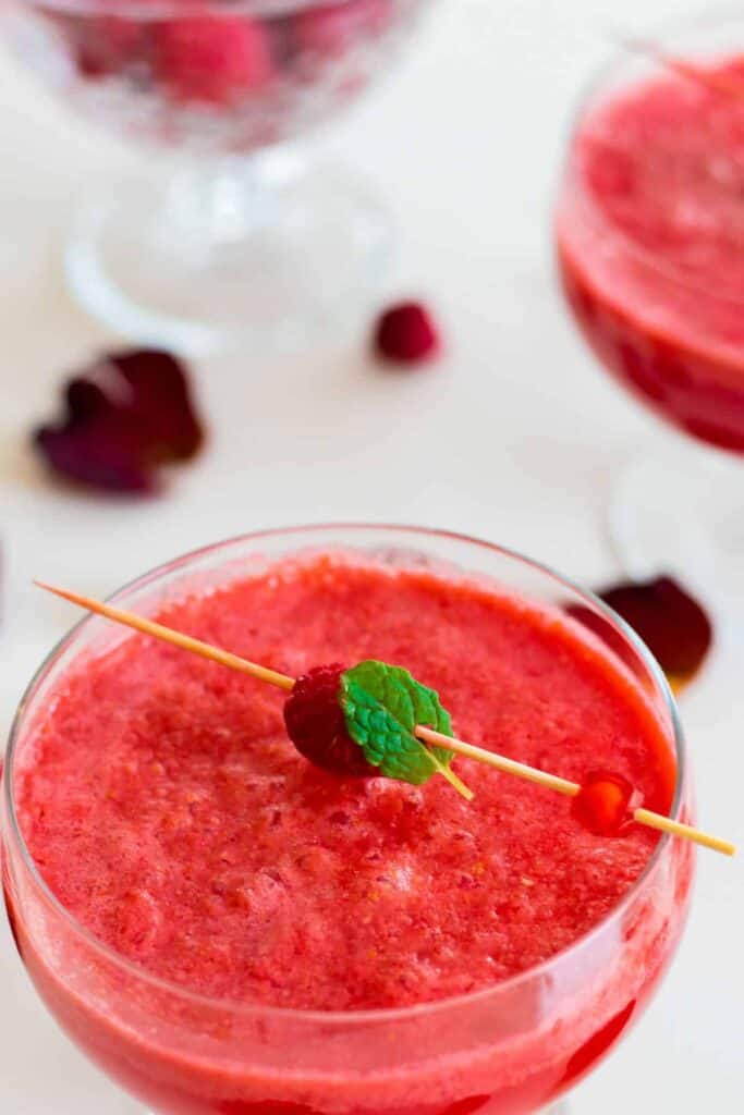 a glass of sparkling raspberry grapefruit mocktail 