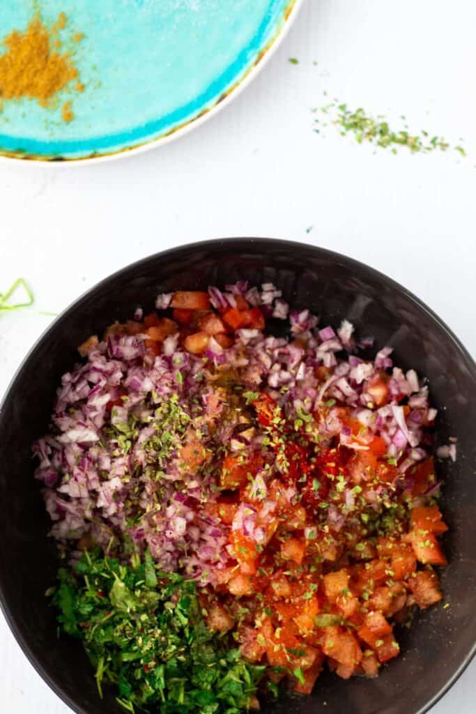 top view of all ingredients for pico de gallo before mixing together