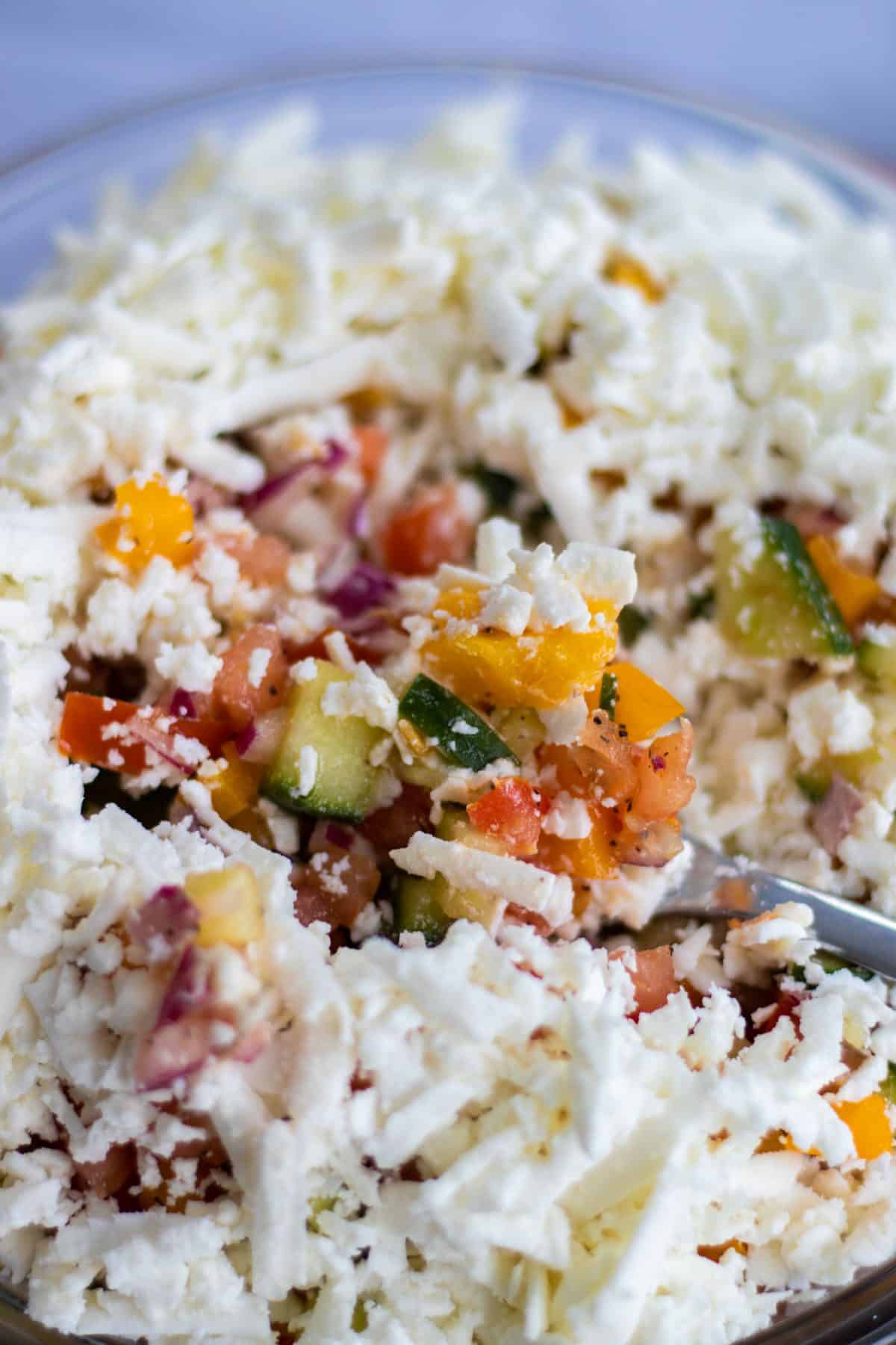 shopska salad in a glass bowl