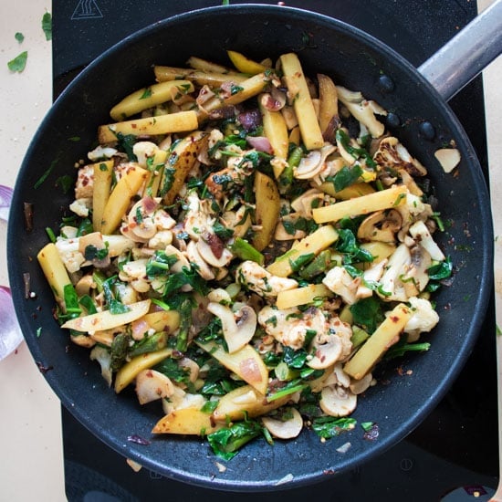 top view of potato halloumi stir-fry in a pan