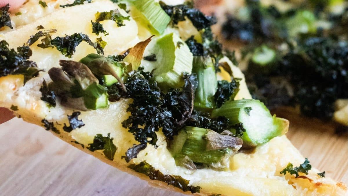 A slice of puff pastry pizza.