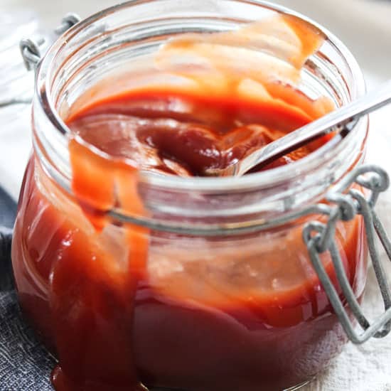 side view of barbecue sauce in a jar