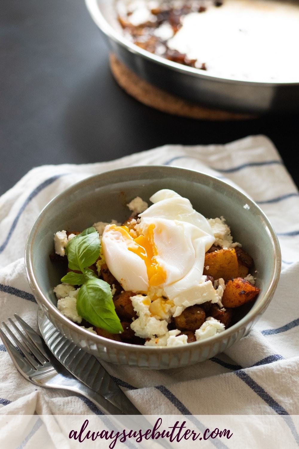 Fried Potatoes Breakfast Bowl with Feta Cheese & Poached Egg