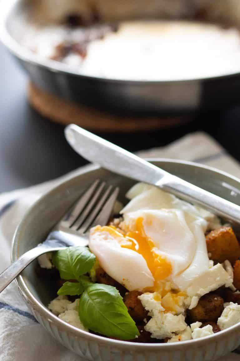 Fried Potatoes Breakfast Bowl with Feta Cheese & Poached Egg