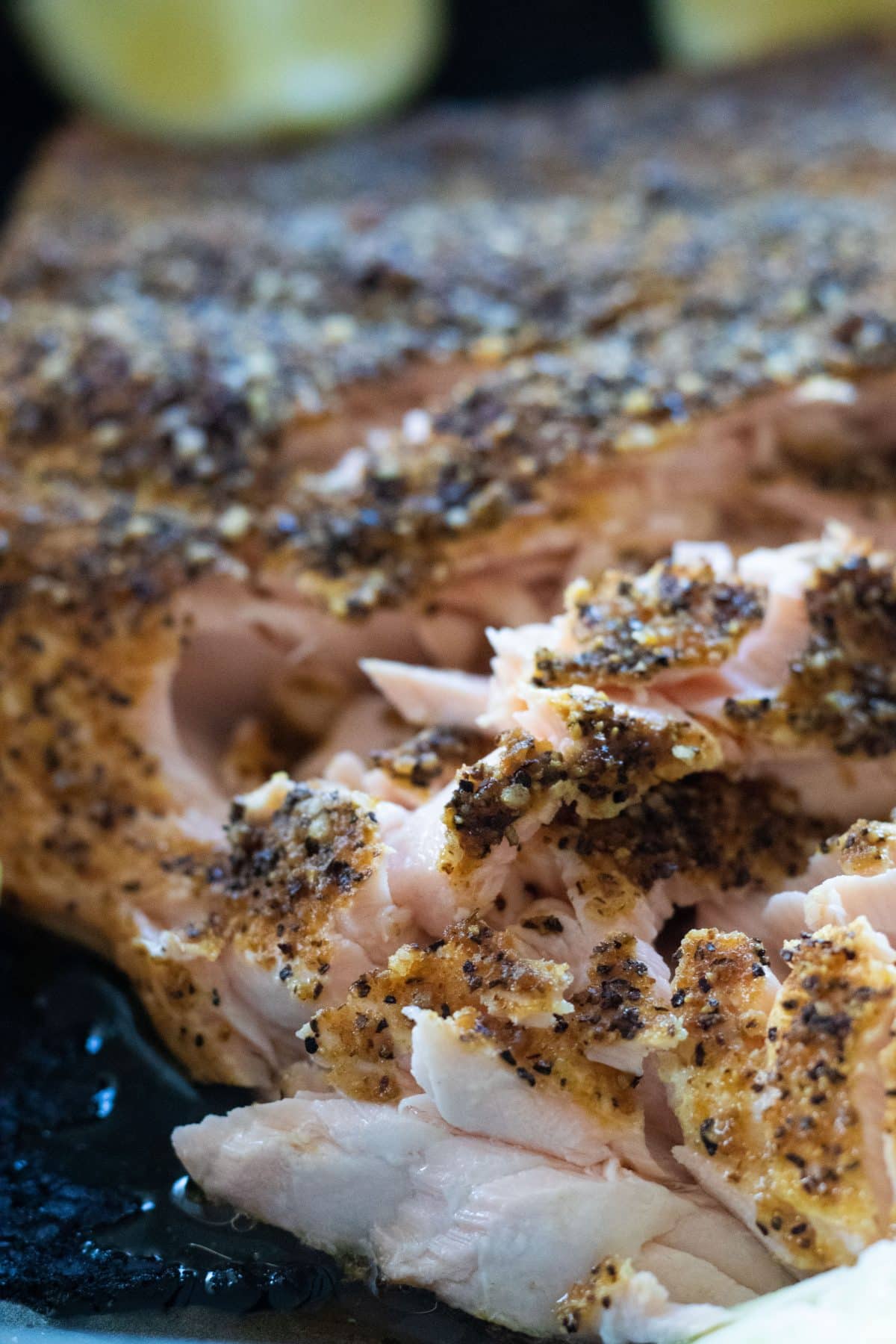 close up of salmon seasoned with lemon pepper.