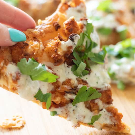 A slice of buffalo cauliflower pizza.