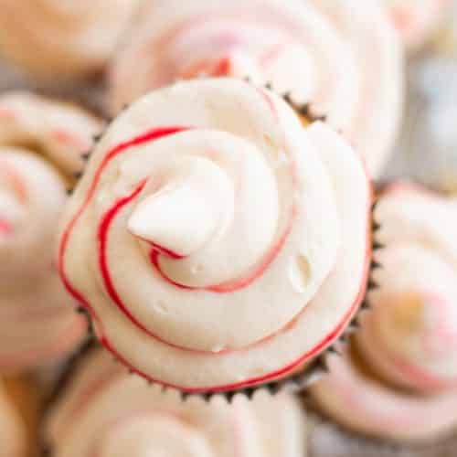 top down view of candy cane whipped cream on top of cupcakes