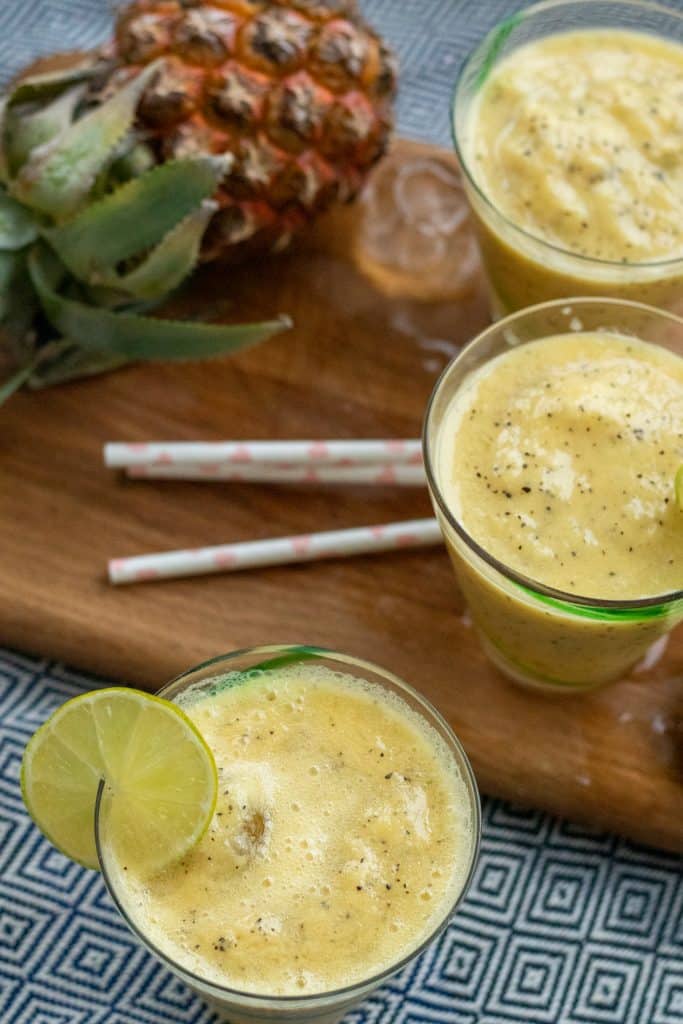 top down view of three frozen pineapple mocktails