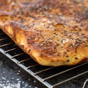 Turkish bread on a cooling rack.