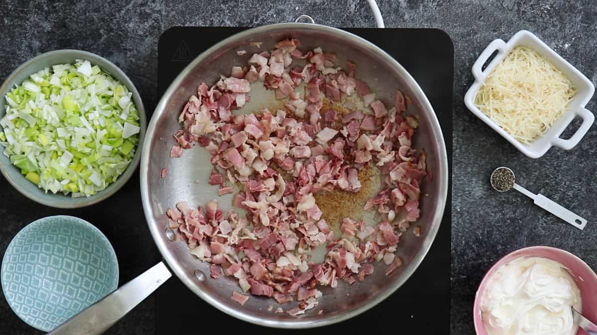 Cooked bacon in a pan.