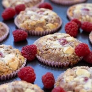 close up of raspberry white chocolate muffins