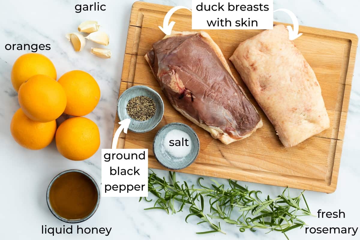ingredients needed to make duck breasts and orange sauce.