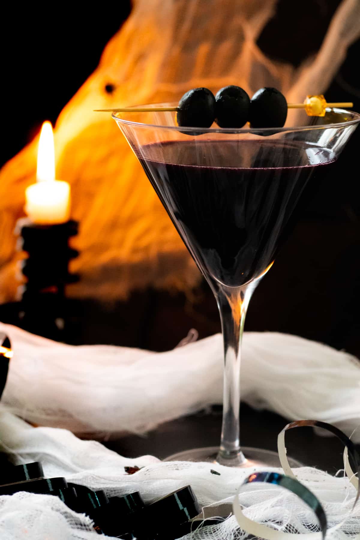 side view of a black widow martini