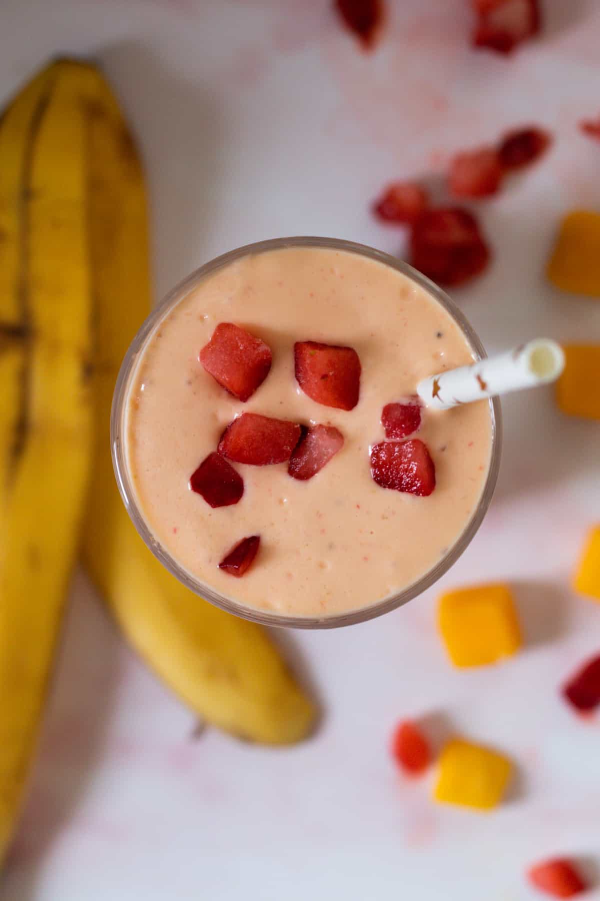 top down view of a strawberry mango smoothie