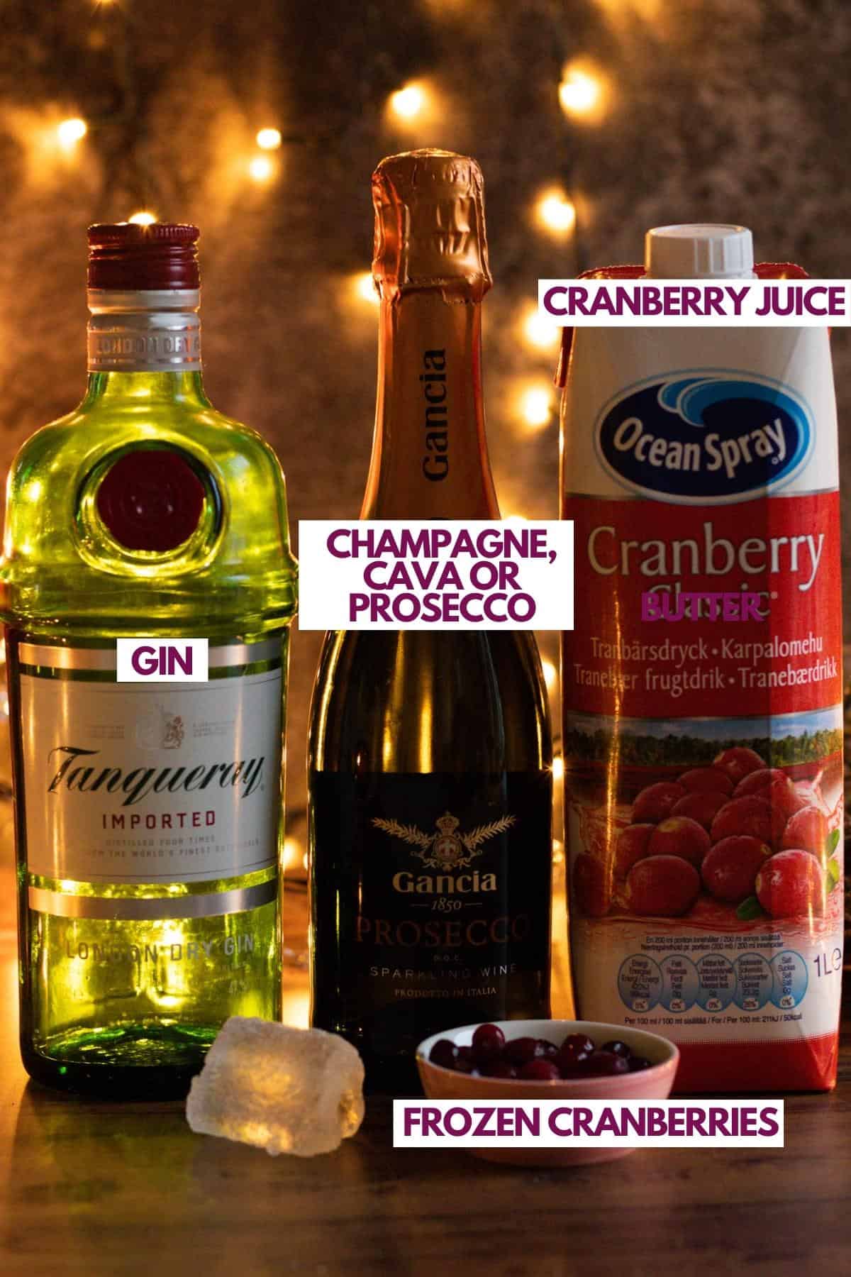 Ingredients needed to make a cranberry champagne cocktail.
