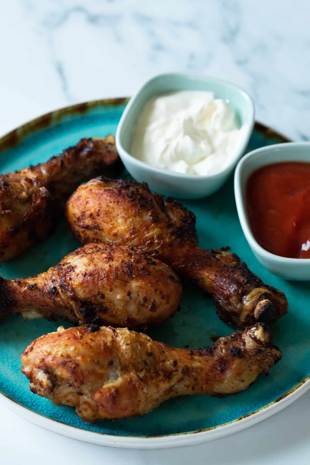 air fryer drumsticks and two dip sauces