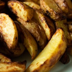 close up of air fryer potato wedges