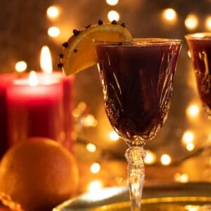 side view of a glass of christmas sangria