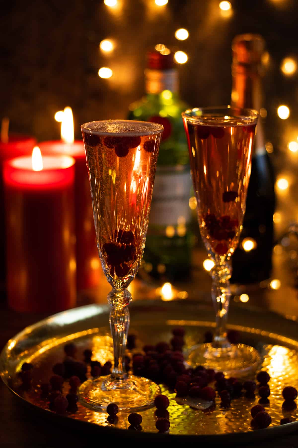 two glasses of cranberry champagne cocktail.