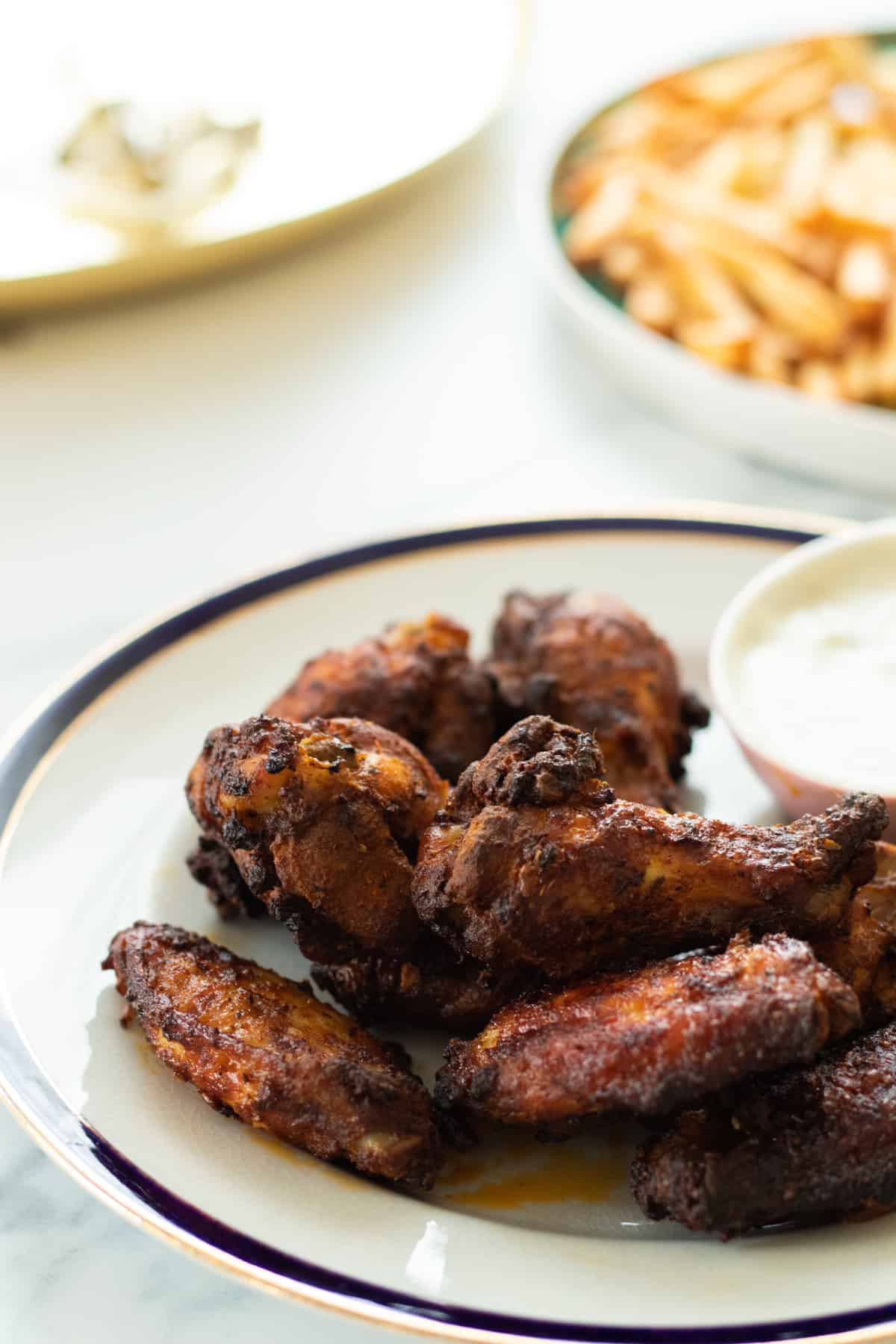 chicken wings on a plate.