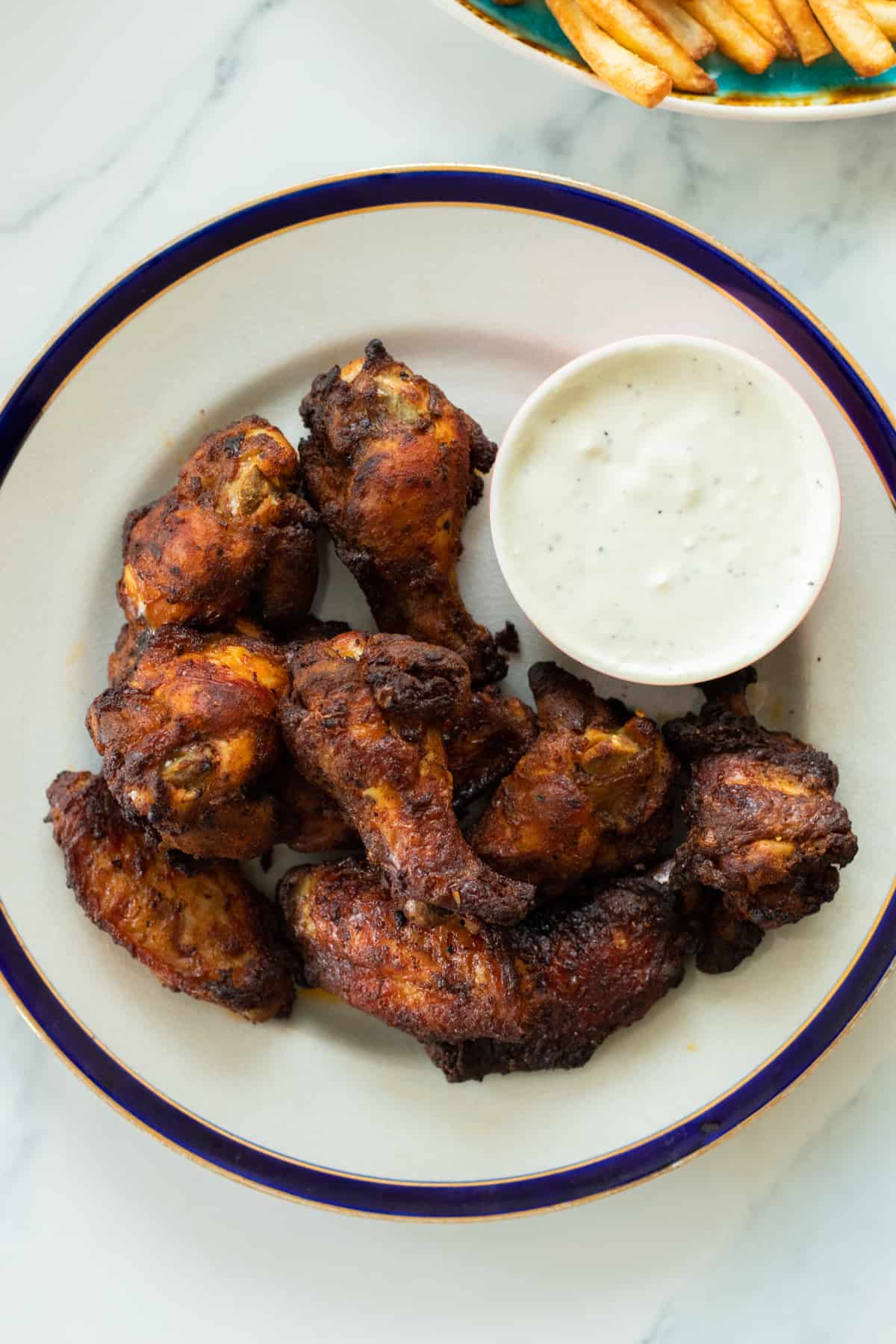 chicken wings on a plate.