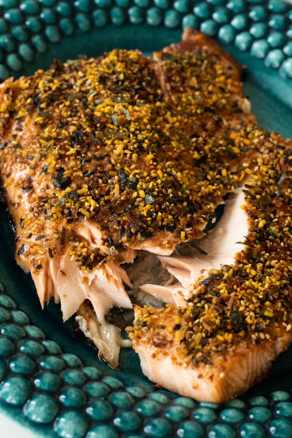 furikake salmon on a blue green plate.