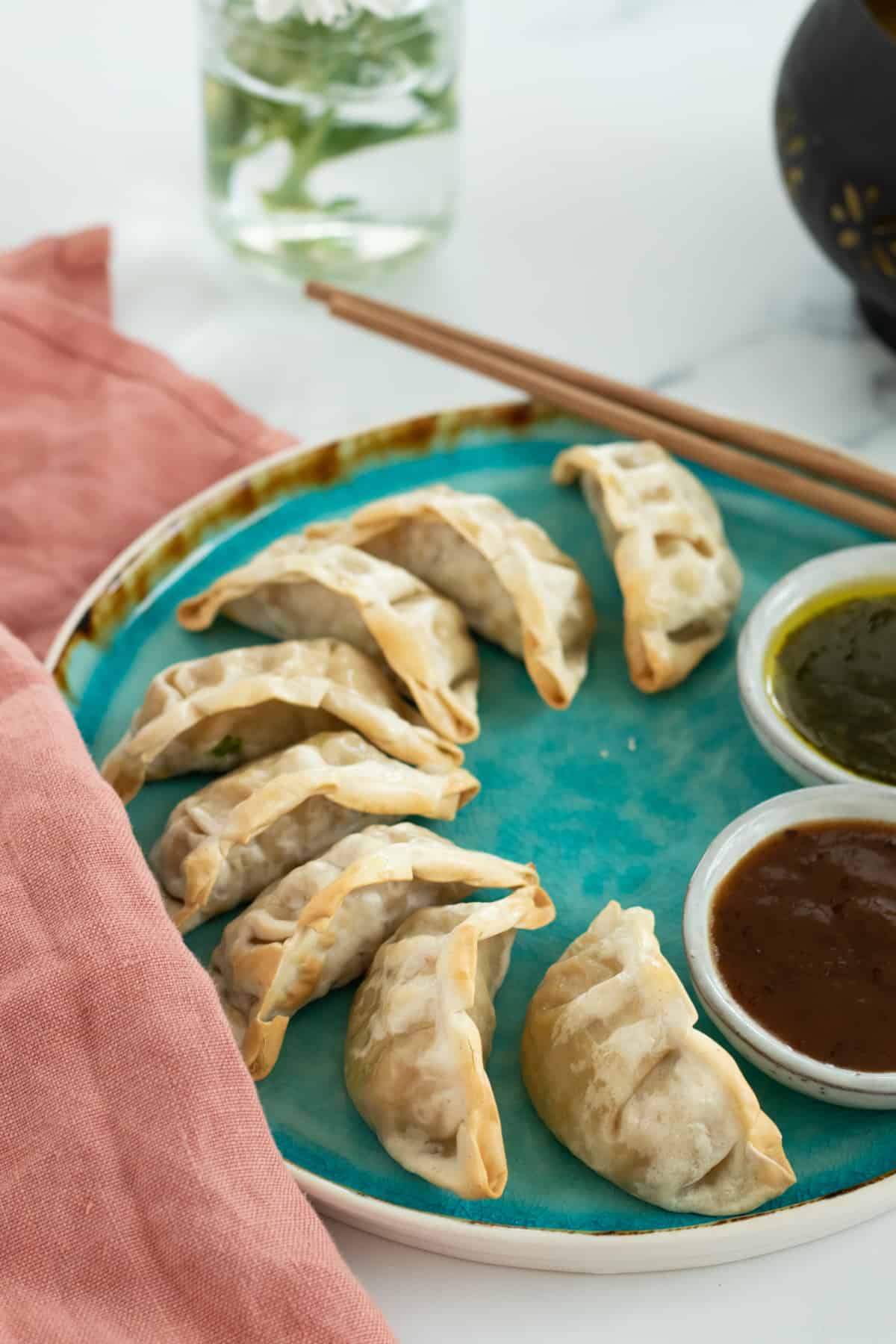 dumplings on a blue plate.