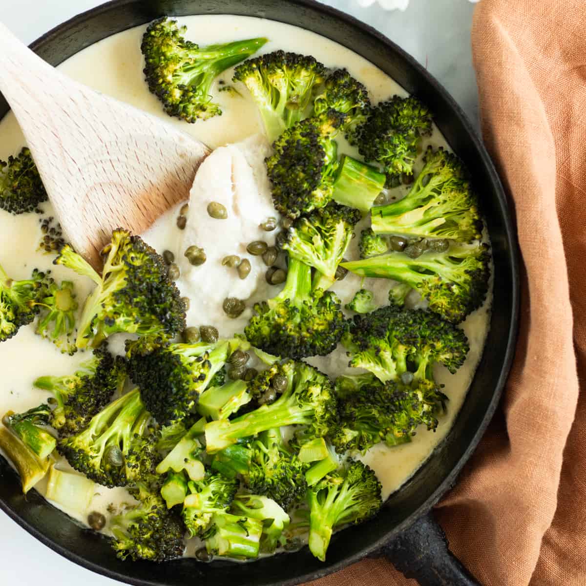 fish & broccoli in lemon butter caper sauce