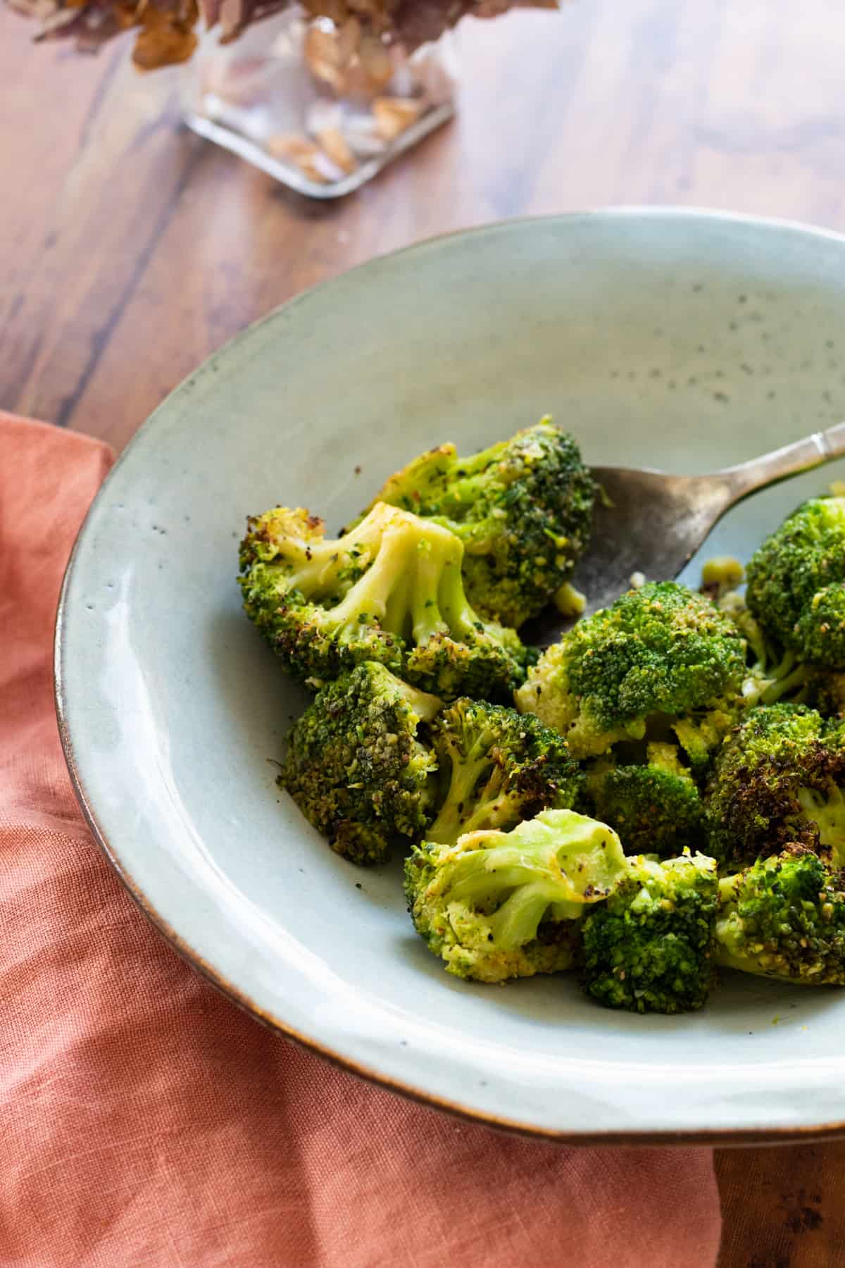 broccoli on a blue plate.