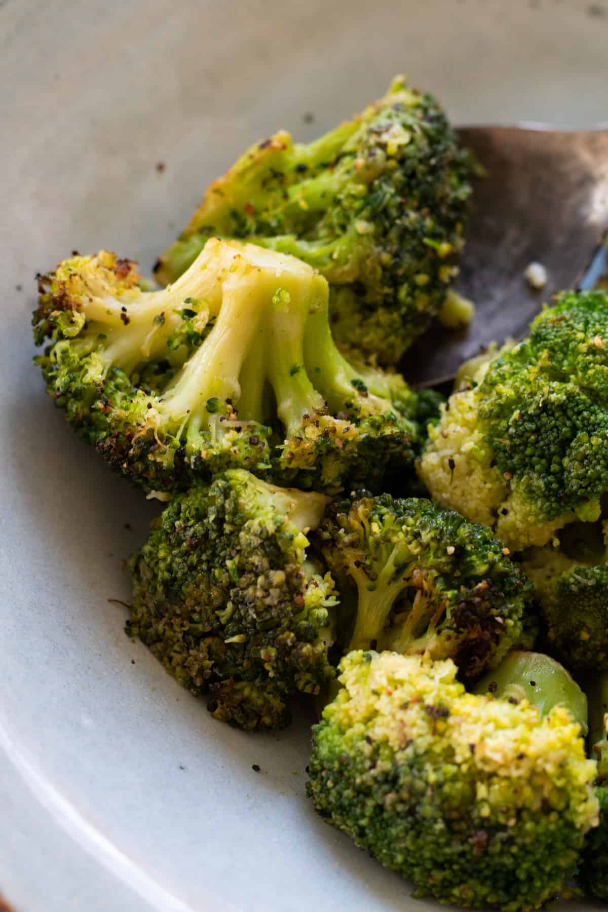 broccoli on a blue plate.