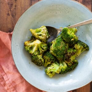 broccoli on a blue plate.