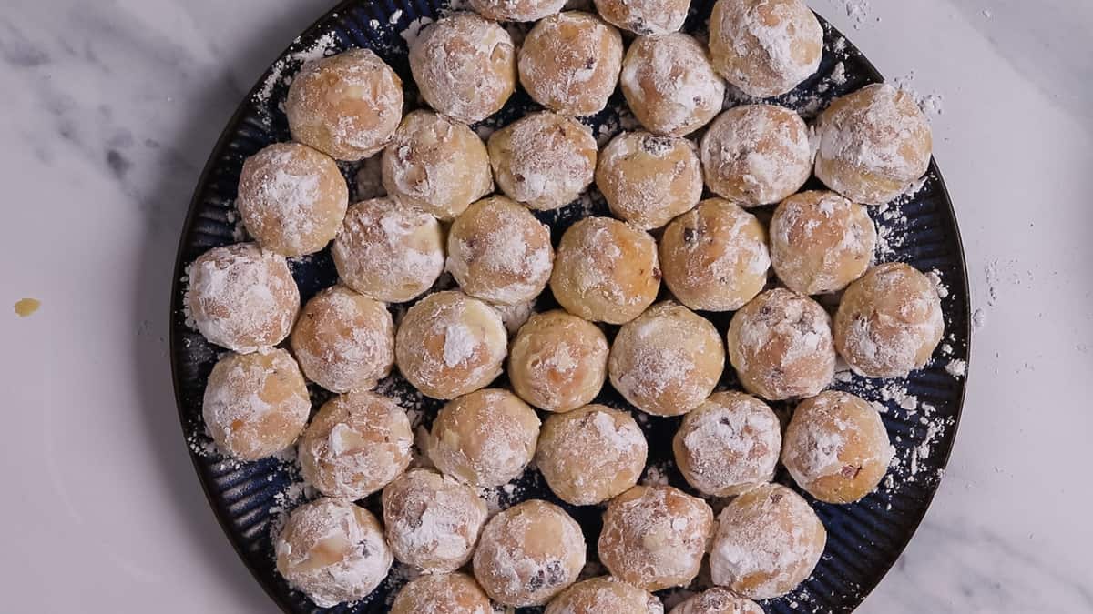 snowballs after being rolled in powdered sugar for the first time