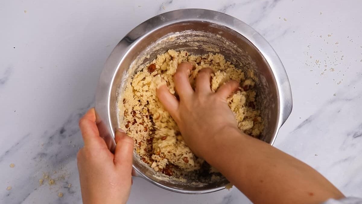 mixing dough with hands