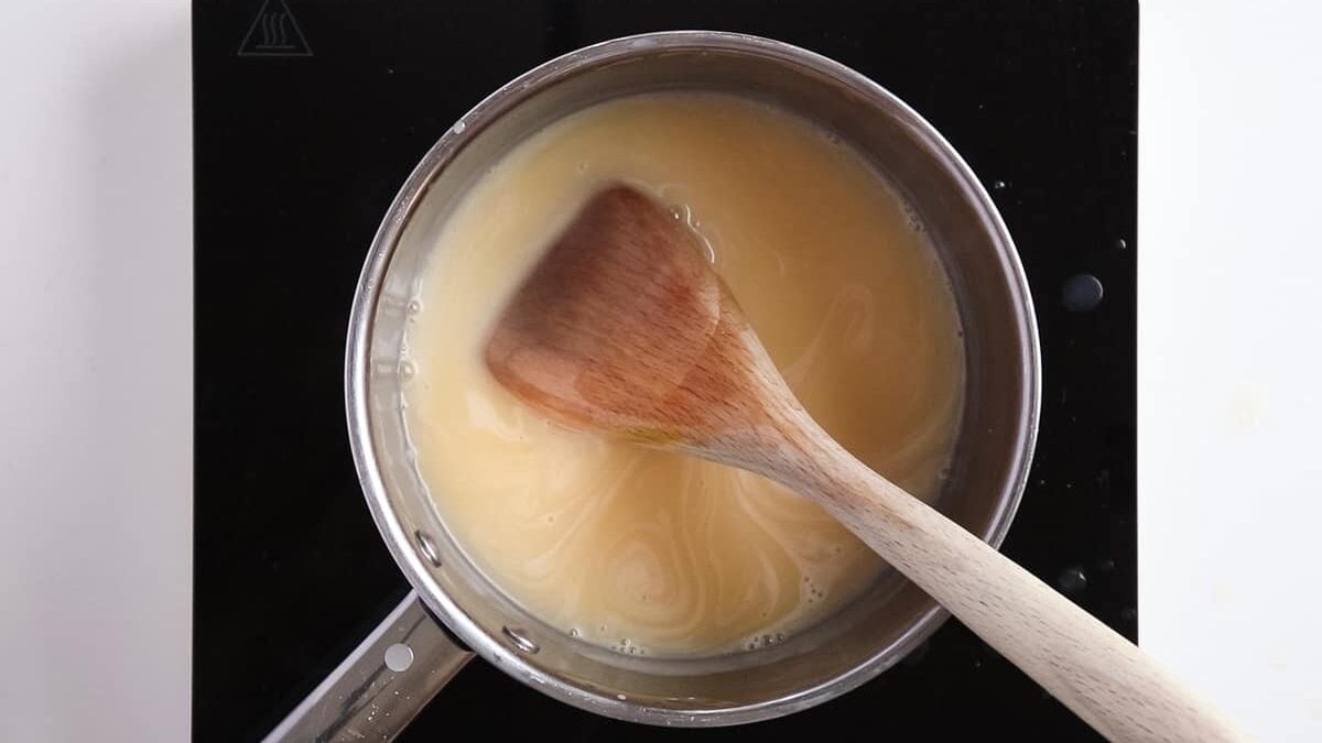 melted candy cane cream in a saucepan