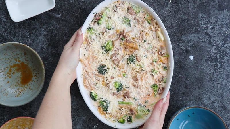 A chicken broccoli pasta bake before baking.