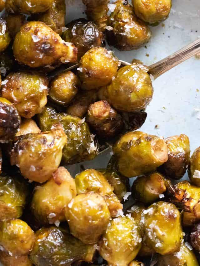 brussel sprouts on a light blue plate