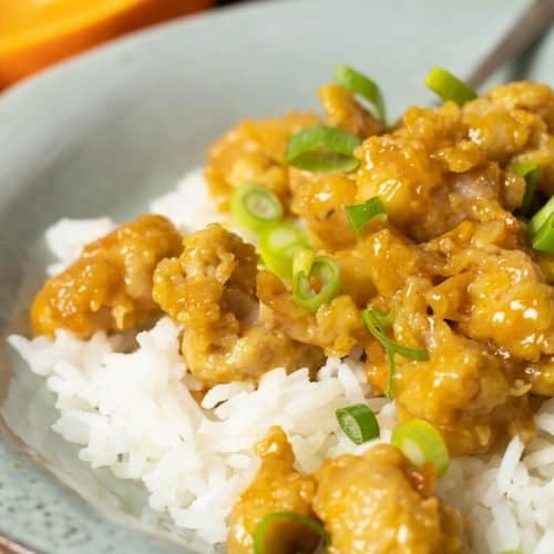 air fryer orange chicken with rice and scallions