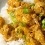 air fryer orange chicken with rice and scallions