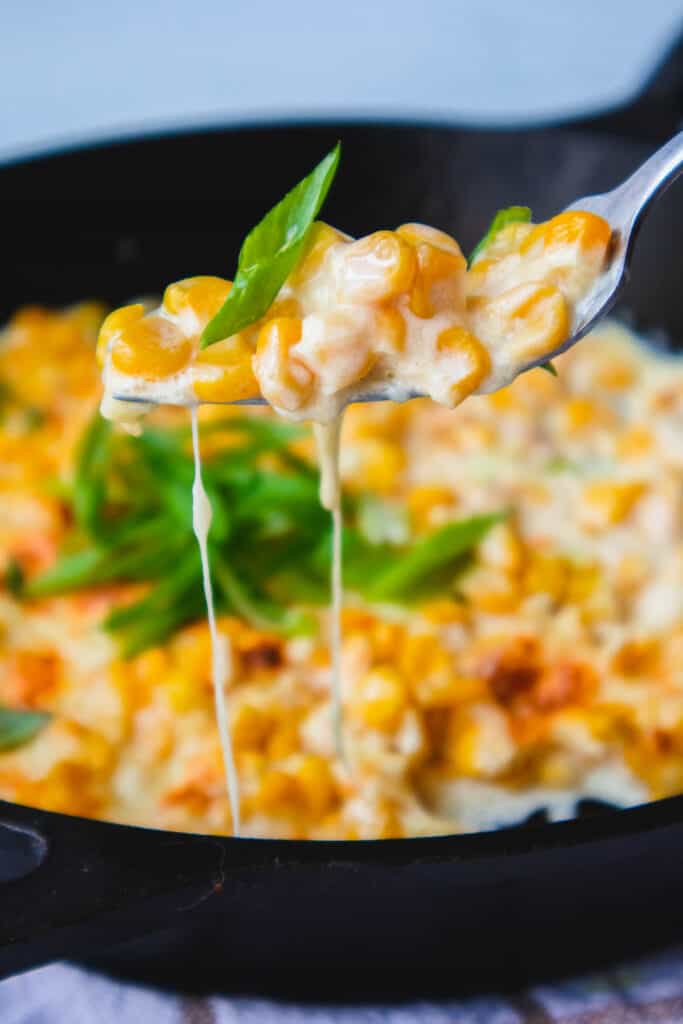 a spoonful of cheesy corn
